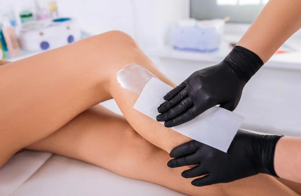Professional leg waxing treatment with gentle, hygienic technique at Jinny's Beauty Studio
